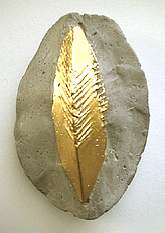 gold leaf and concrete pin